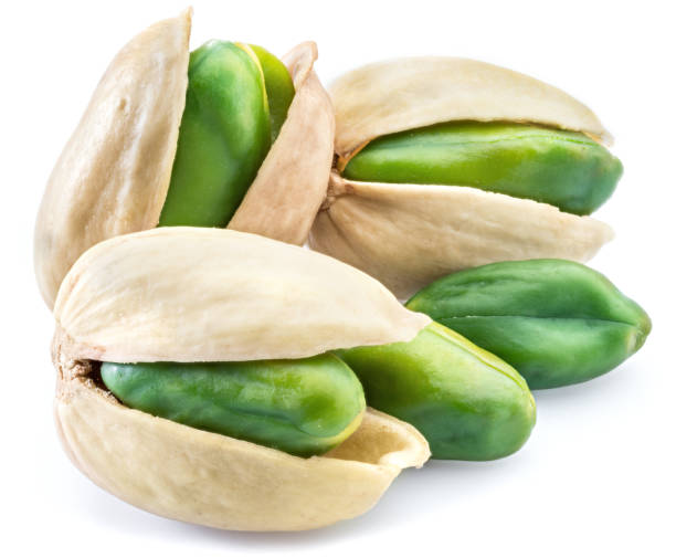 istock Green pistachio nuts with pistachio shell. 951658974