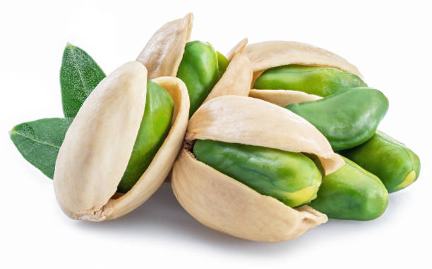 istock Green pistachio nuts with pistachio shell. 951659040