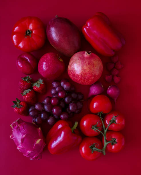 Red fruits and vegetables Looking down on monochrome red fruits and vegetables still life photos stock pictures, royalty-free photos & images