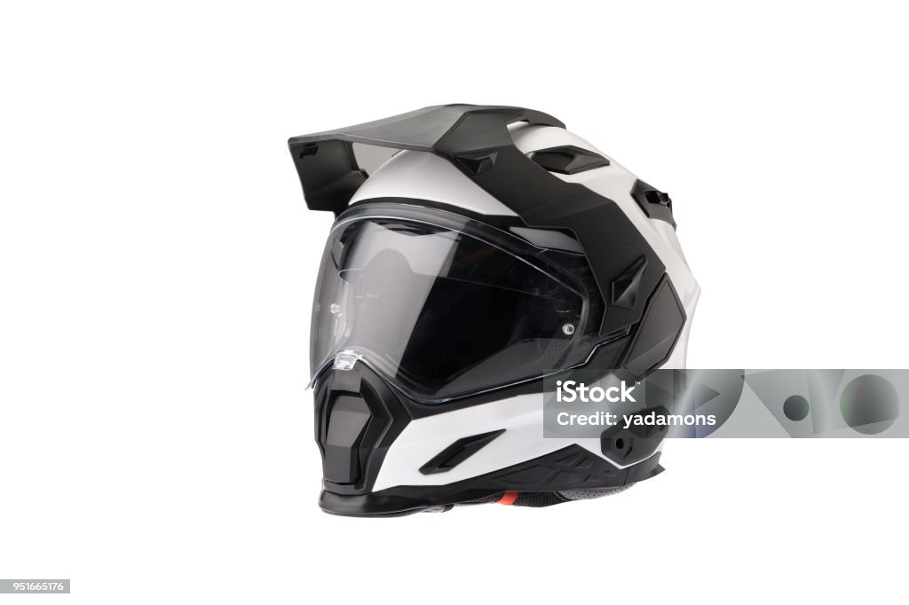 Full face Motorcycle white helmet, close the face shield. Full face Motorcycle white helmet, close the face shield use to protect the head from injuries. Isolated image with white background Motocross Stock Photo