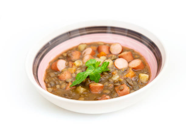 istock Traditional homemade Sausages with beans soup 951665604