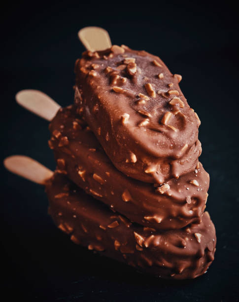 istock Vanilla Ice Cream with Chocolate on a Stick 951667016