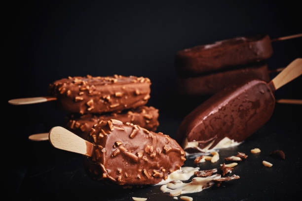 istock Vanilla Ice Cream with Chocolate on a Stick 951667022
