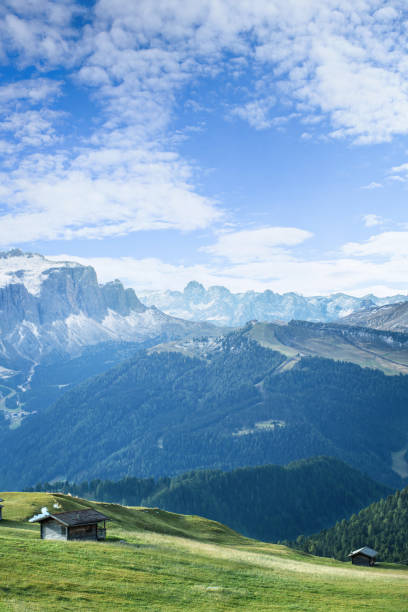 istock landscape with wooden house in Dolomites Apl 951668122