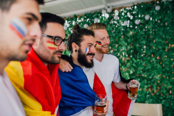 istock Friends watching soccer world championship 951669152