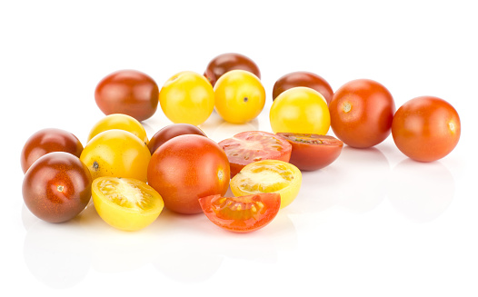 Grape cherry tomatoes mix stack isolated on white background red black yellow collection varieties