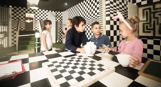 Photo of children play in the chess quest room