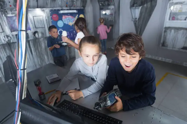 Photo of Children playing in bunker questroom