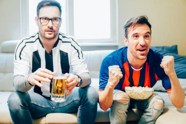 istock Male football supporters 951675098