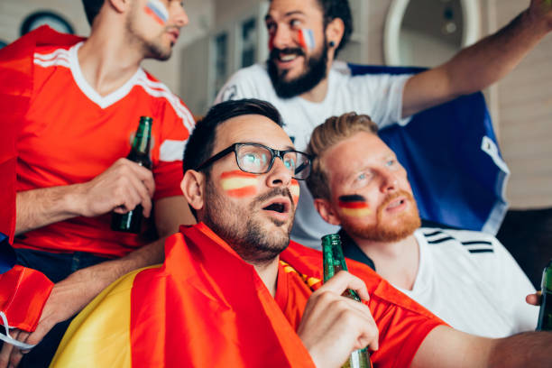 istock Surprised male football supporters 951677328