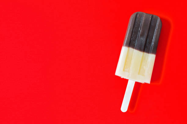 istock Chocolate caramel ice cream on a red background, copy space. 951679314