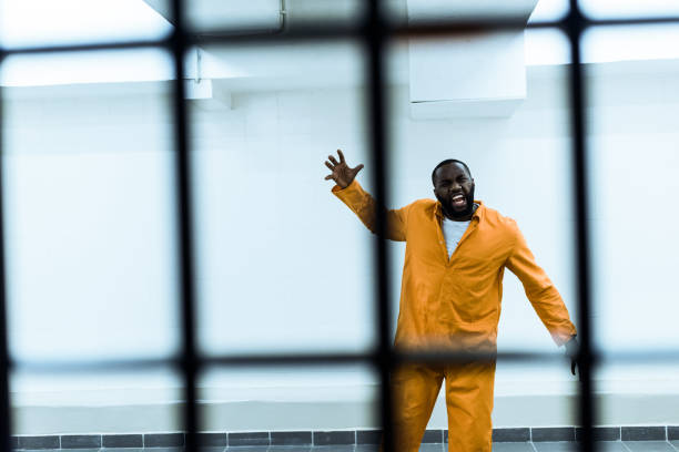 istock african american prisoner screaming in prison cell 951679836