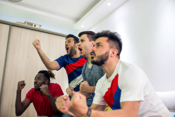 istock men watch a sports game 951682452
