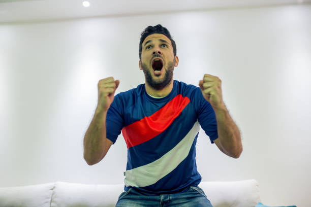 istock men watching a sports game 951682932