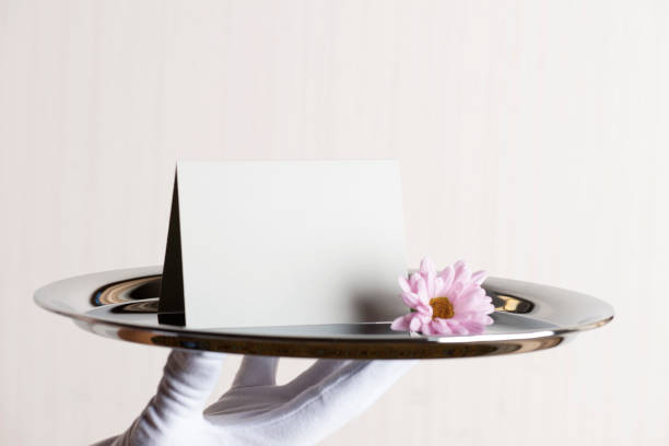 greeting card on tray - tray glove butler white imagens e fotografias de stock