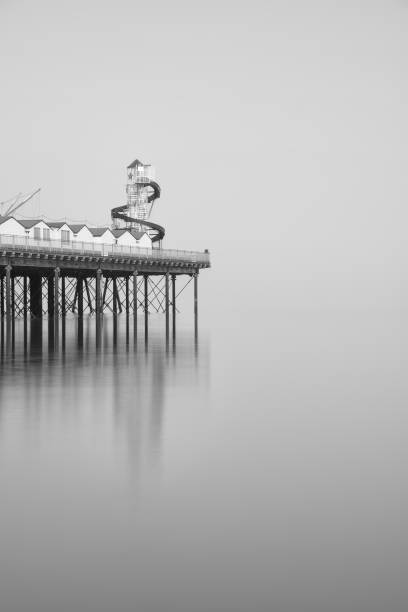 istock Minimalist fine art image of pier in black and white 951691708