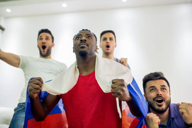 istock men watch a sports game 951692664