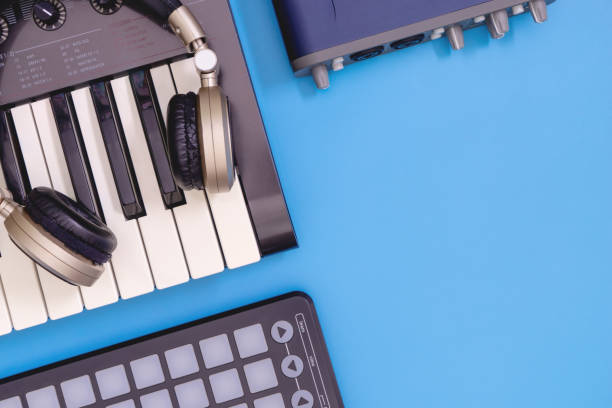 istock DJ home studio equipment top view with blue copy space 951694390