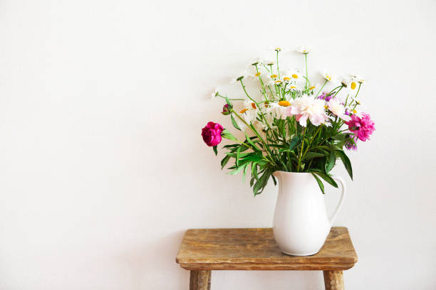 istock Still life with flower bouquet in white vase 951698156