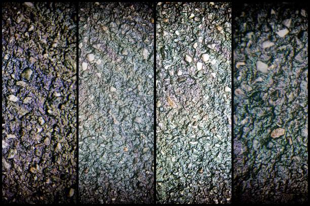 Oil spill on asphalt road, abstract background or texture foe web site or mobile devices.