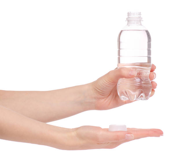 istock A bottle of water in hand 951700748