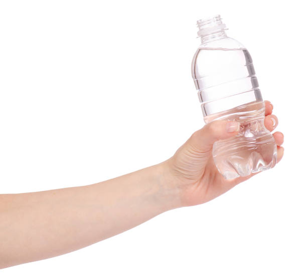 istock A bottle of water in hand 951701016
