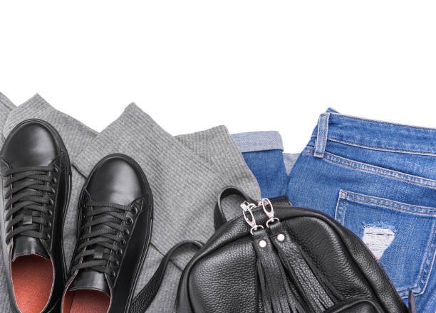 istock Sneakers backpack jeans and a light sweater. 951702818