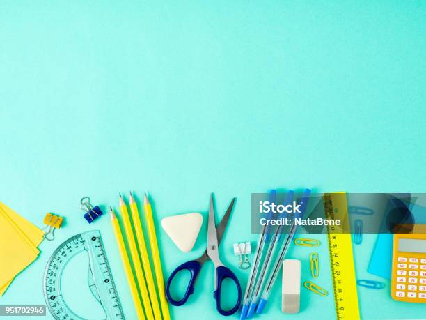 Top View Of Modern Bright Blue Office Desktop With School Supplies On Table Empty Space For Text Back To School Concept Stock Photo - Download Image Now