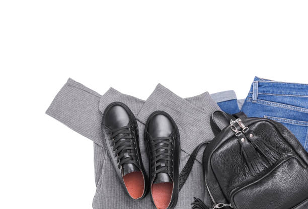 istock Sneakers backpack jeans and a light sweater. 951703248