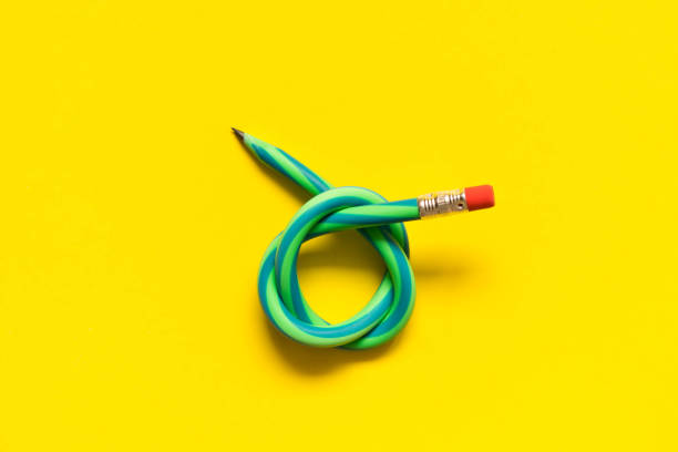 istock Flexible pencil . Isolated on yellow background 951704498