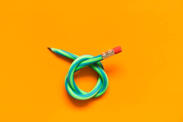 istock Flexible pencil . Isolated on orange background 951705552