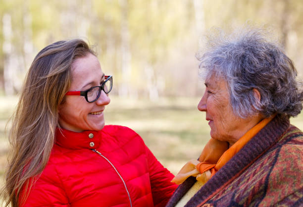 istock Happy elderly woman with her daughter 951709512