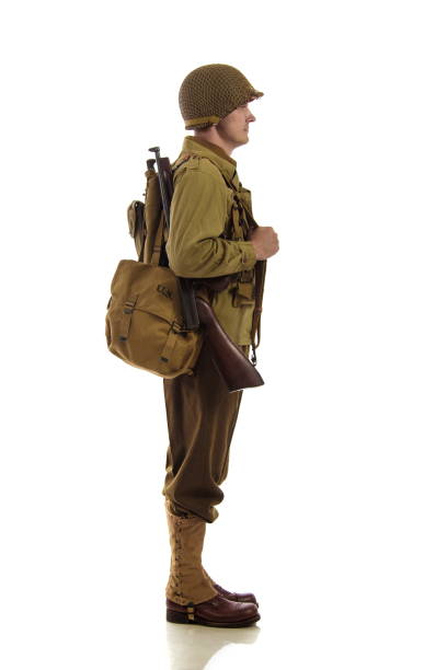 man actor in military uniform of american ranger of world war ii period posing against white background - sea battle imagens e fotografias de stock