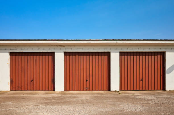 istock Row of garages with closed gates. 951710254