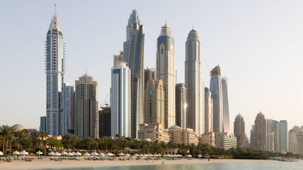 istock Dubai Marina tall skyscrapers in a bright warm evening 951711130