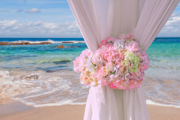 istock Perfect for a beach Wedding under a canopy on a beautiful summer day 951713932
