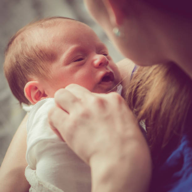 istock Mother with her newborn baby 951714852