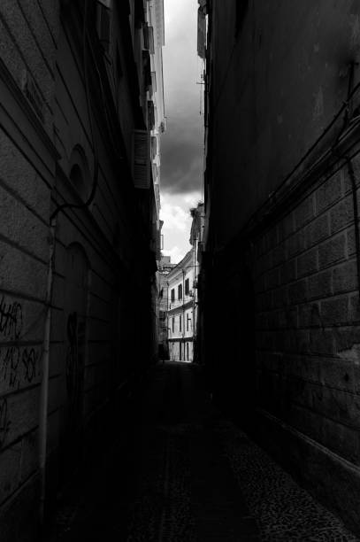 istock Dark alley in sardinian old town 951722892
