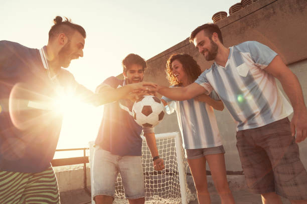 istock Holding a soccer ball 951723212