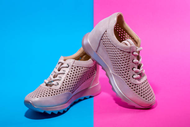 istock Pink Women's sneakers on a white background 951732726