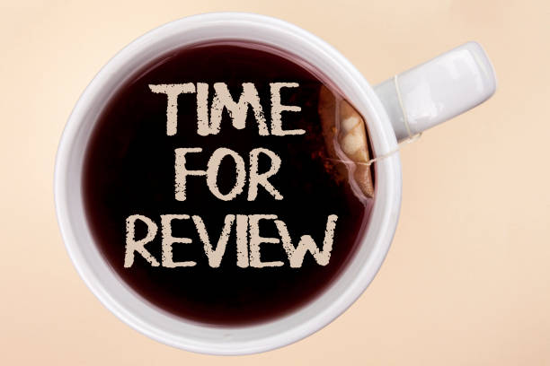 istock Handwriting text writing Time For Review. Concept meaning Giving Feedback Evaluation Rate job test or product Qualify written on Tea in a Cup on the plain background Tea Bag. 951738414