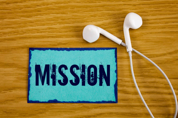 istock Writing note showing  Mission. Business photo showcasing Corporate goal Important Assignment Business purpose and focus written on Sticky Note Paper on wooden background Handsfree next to it. 951746844