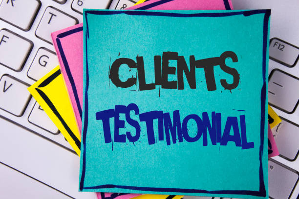Handwriting text writing Clients Testimonial. Concept meaning Customers Personal Experiences Reviews Opinions Feedback written on Sticky note paper placed on Laptop Keyboard Sticky Note papers.
