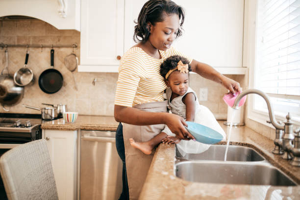 istock Mom and toddler baking together 951760606