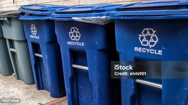 Blue Garbage Bins With The White Recycle Logo Stock Photo - Download Image Now - Recycling Bin, Blue, Recycling