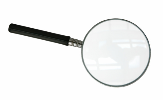 magnifying glass with scan search concept and state of the art electronic technology background