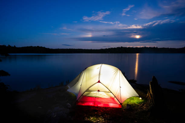istock Tent and Nighttime Wilderness Lake 951810530
