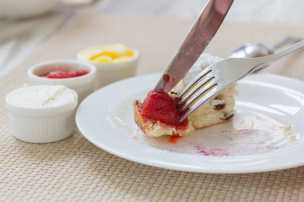 Luxury afternoon tea with dessert on wooden table.