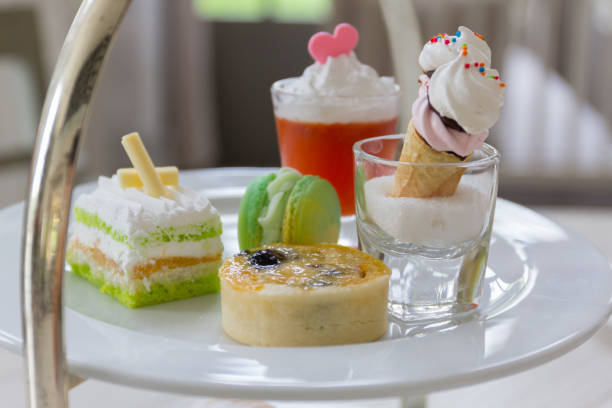 istock Luxury afternoon tea with dessert on wooden table. 951823600