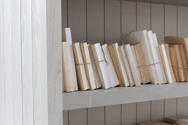 istock Bookshelf is white book with wooden white shelf. 951823624